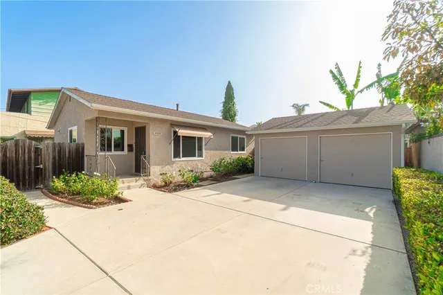 a house view with a outdoor space
