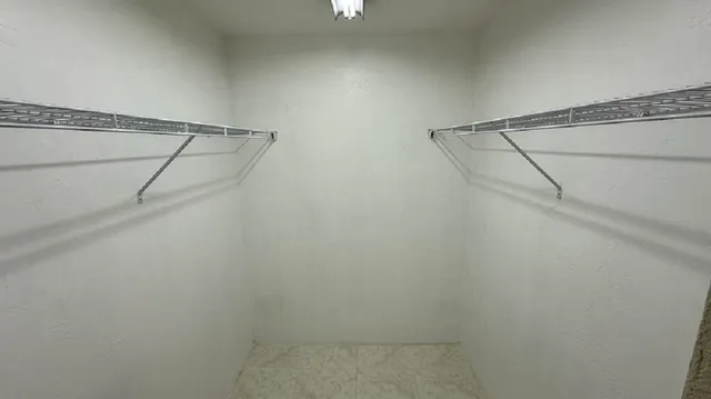 a room with furniture and wooden floor