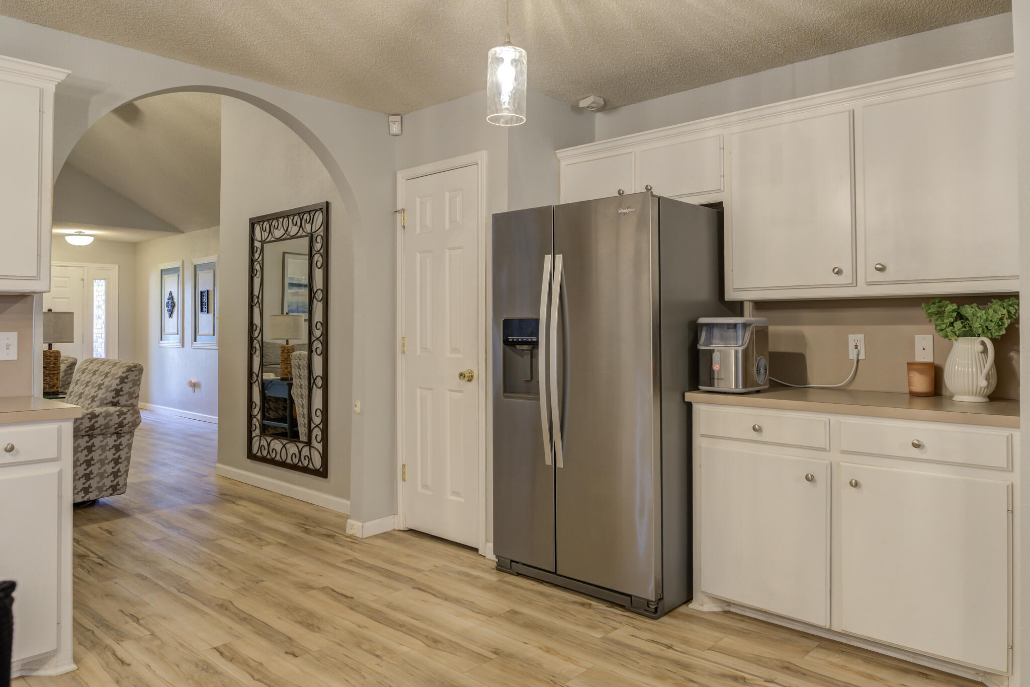 5813 88th Place Lubbock, TX 79424 - Photo 14 of 30 a kitchen with stainless steel appliances a refrigerator sink and cabinets