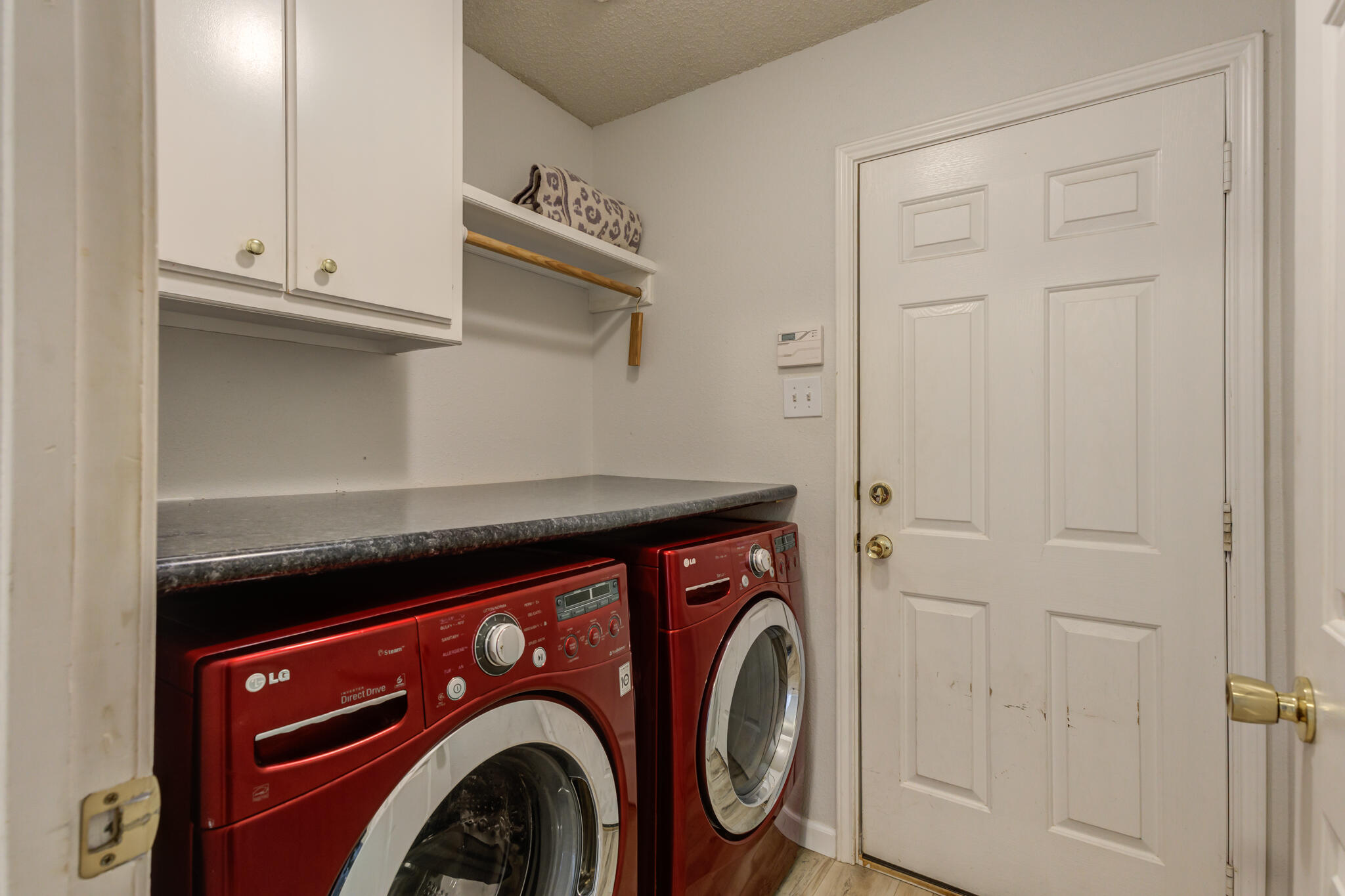 5813 88th Place Lubbock, TX 79424 - Photo 28 of 30 a utility room with dryer and washer