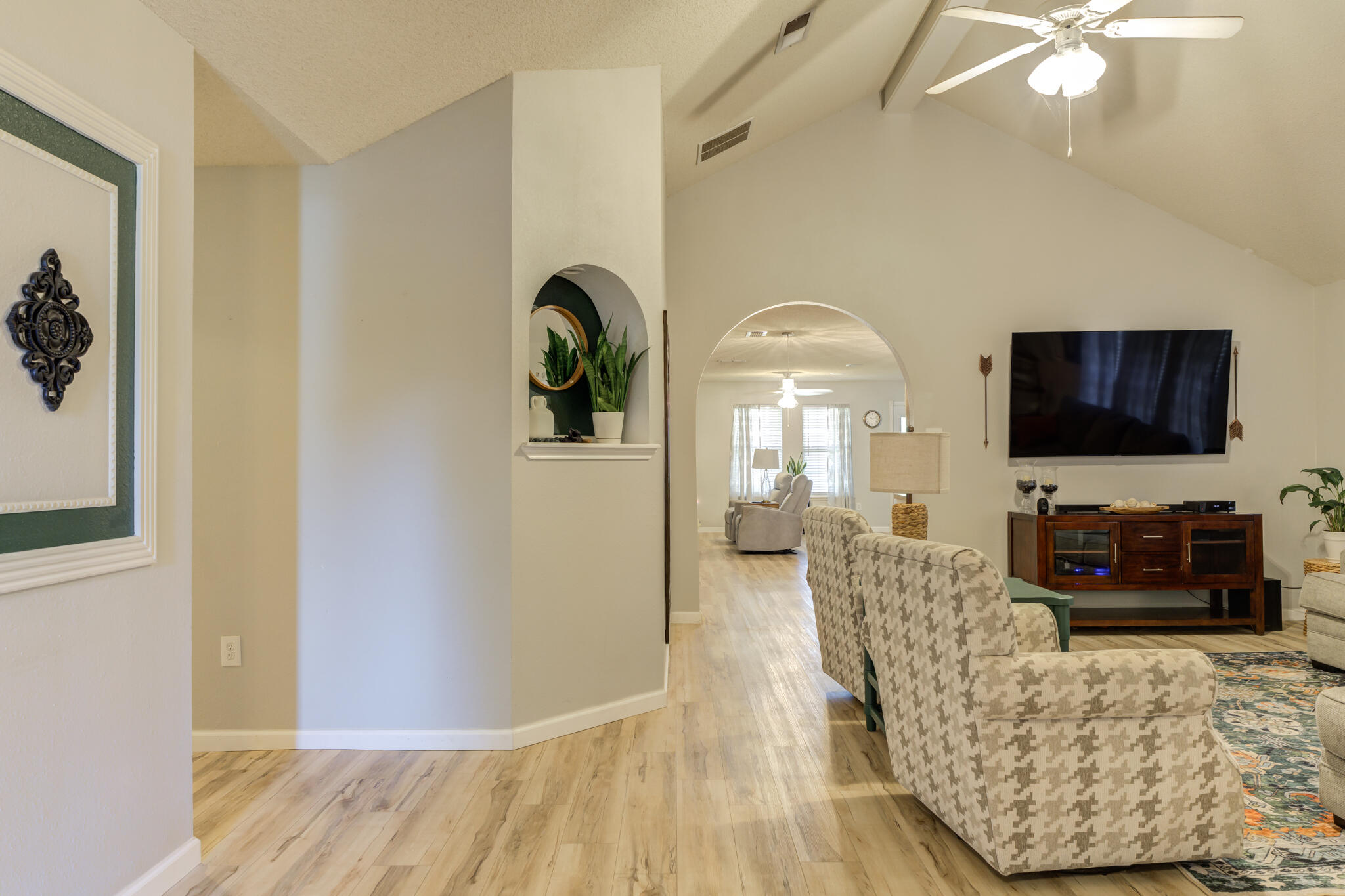 5813 88th Place Lubbock, TX 79424 - Photo 3 of 30 a living room with furniture and a flat screen tv
