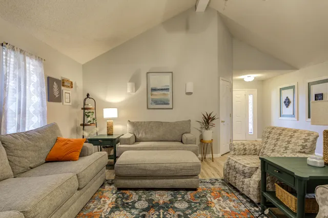 a living room with furniture and a couch