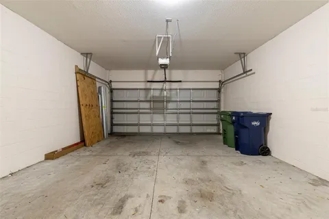 a view of a garage with stairs