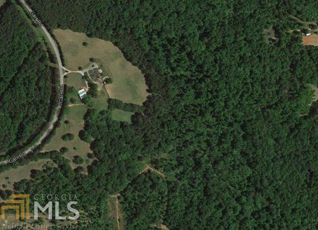 661 Garr Road Jackson, GA 30233 - Photo 1 of 1 an aerial view of a house with a yard and tree s