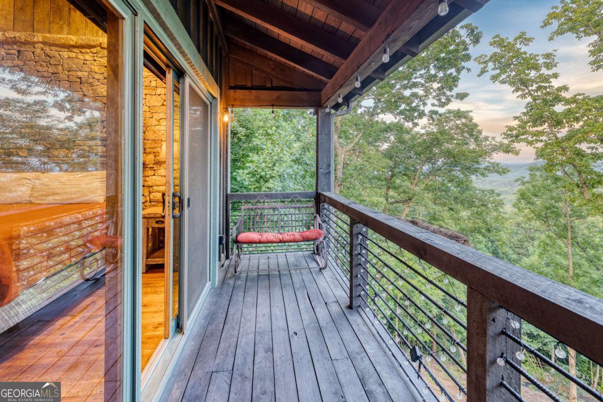 280 Pointe Of View, Unit 15 Blue Ridge, GA 30513 - Photo 27 of 72 a view of balcony with wooden floor