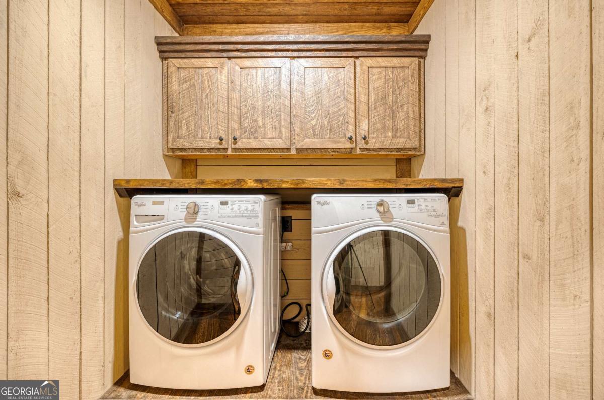280 Pointe Of View, Unit 15 Blue Ridge, GA 30513 - Photo 60 of 72 a close view of a utility room with dryer and washer
