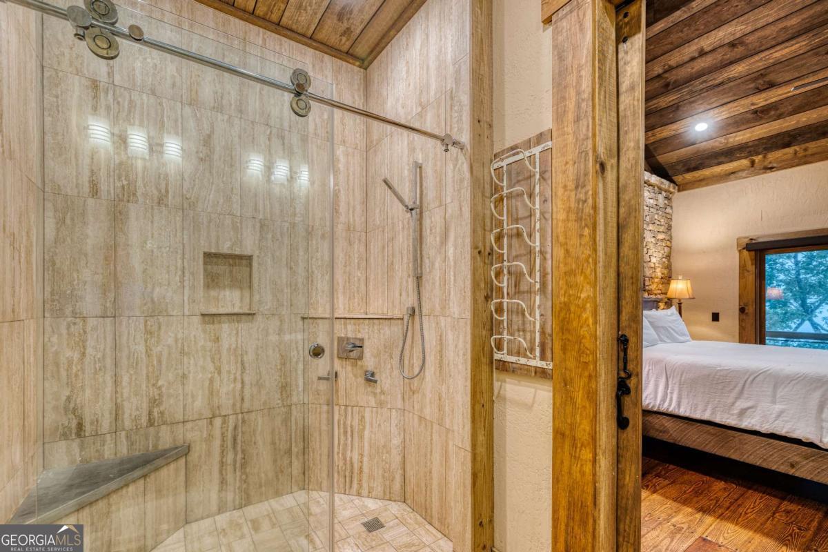 280 Pointe Of View, Unit 15 Blue Ridge, GA 30513 - Photo 67 of 72 a bathroom with a shower and a sink