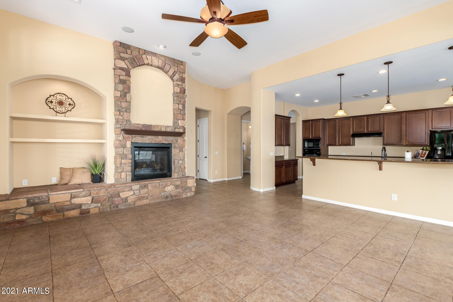 18364 West Desert Trumpet Road Goodyear, AZ 85338 - Photo 11 of 69 Great Room with Fireplace