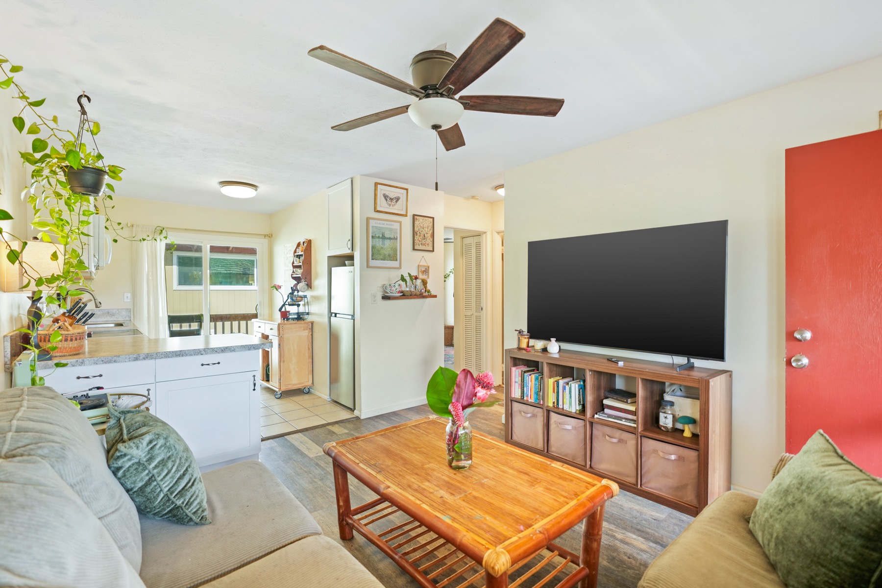 4461 Kamoa Road, Unit F21 Kapaa, HI 96746 - Photo 3 of 20 a living room with furniture and a flat screen tv