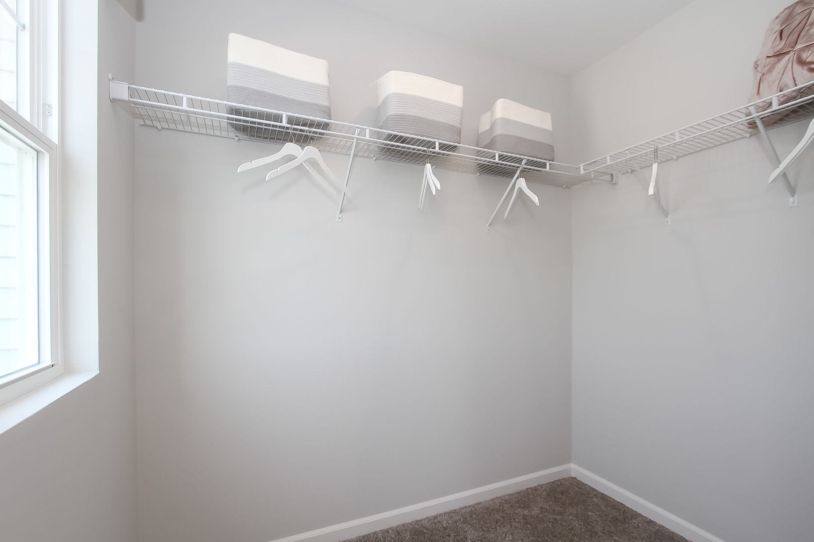 324 Kingsport Drive South Elgin, IL 60177 - Photo 14 of 25 a view of a room with racks on the wall