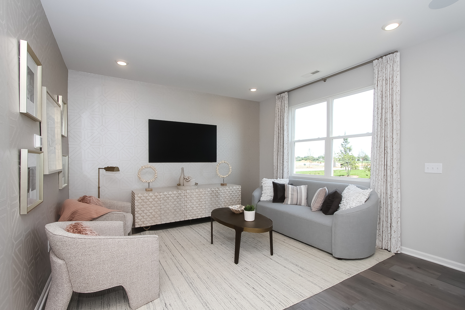 324 Kingsport Drive South Elgin, IL 60177 - Photo 3 of 25 a living room with furniture and a flat screen tv