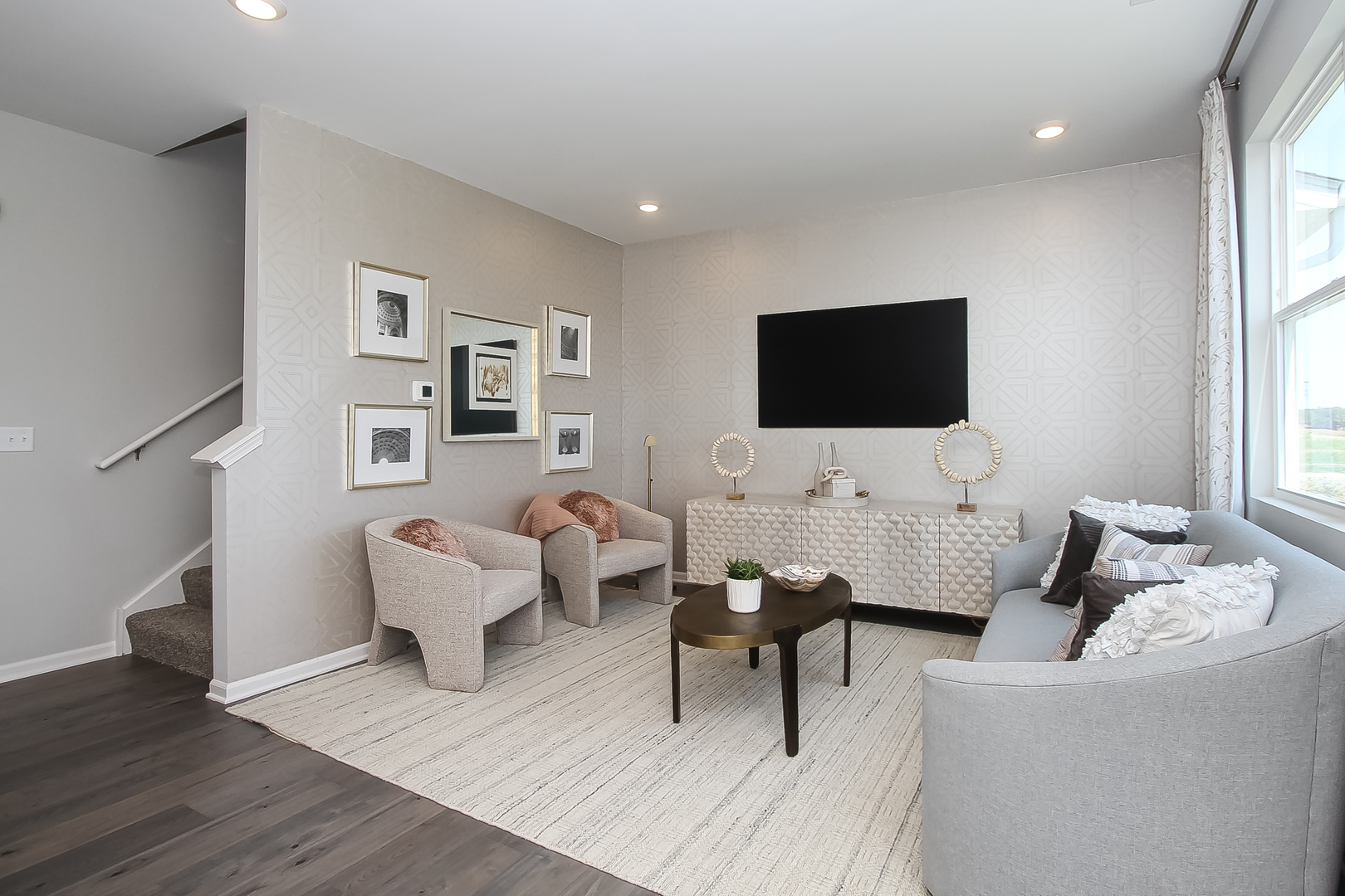 324 Kingsport Drive South Elgin, IL 60177 - Photo 4 of 25 a living room with furniture and a flat screen tv