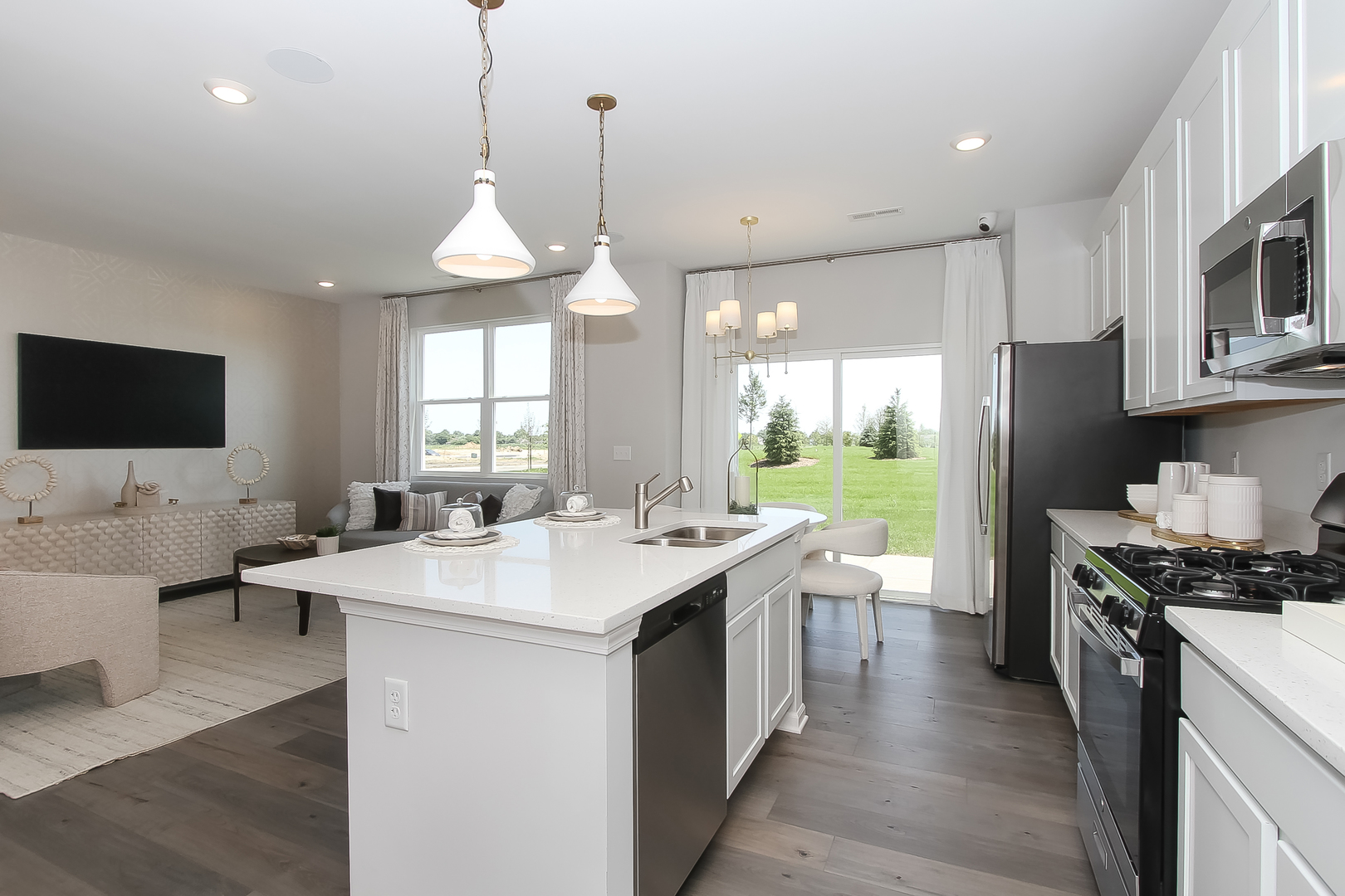 324 Kingsport Drive South Elgin, IL 60177 - Photo 9 of 25 a kitchen with a sink stove and refrigerator