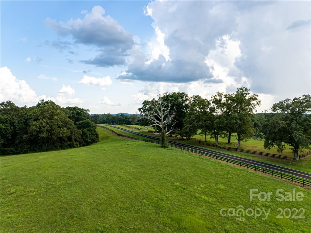 11-a R A R Thompson Road Mill Spring, NC 28756 - Photo 2 of 4 a view of a golf course with a lake