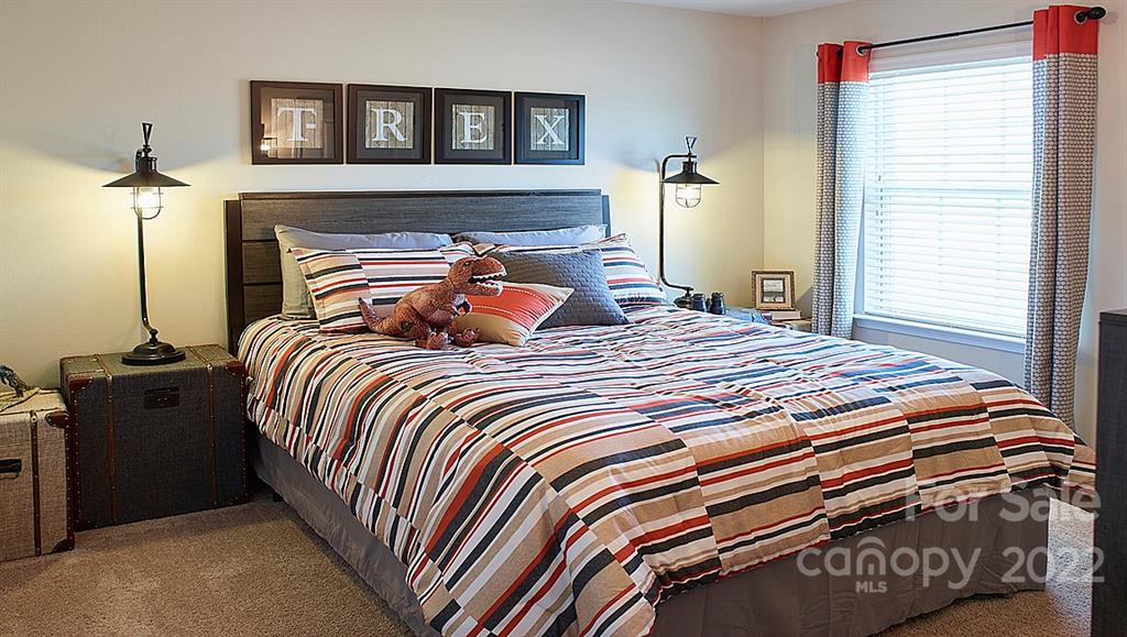 304 Gaines Road Clover, SC 29710 - Photo 6 of 48 a bedroom with a bed and a window