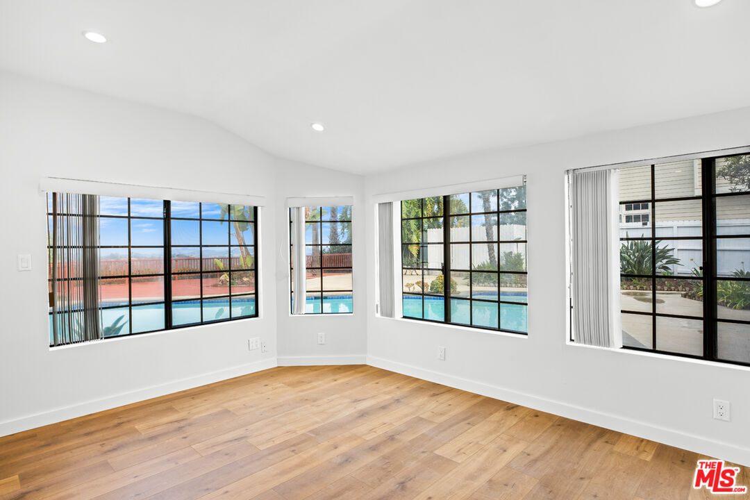 2254 Stradella Road Los Angeles, CA 90077 - Photo 20 of 27 a view of an empty room with a window