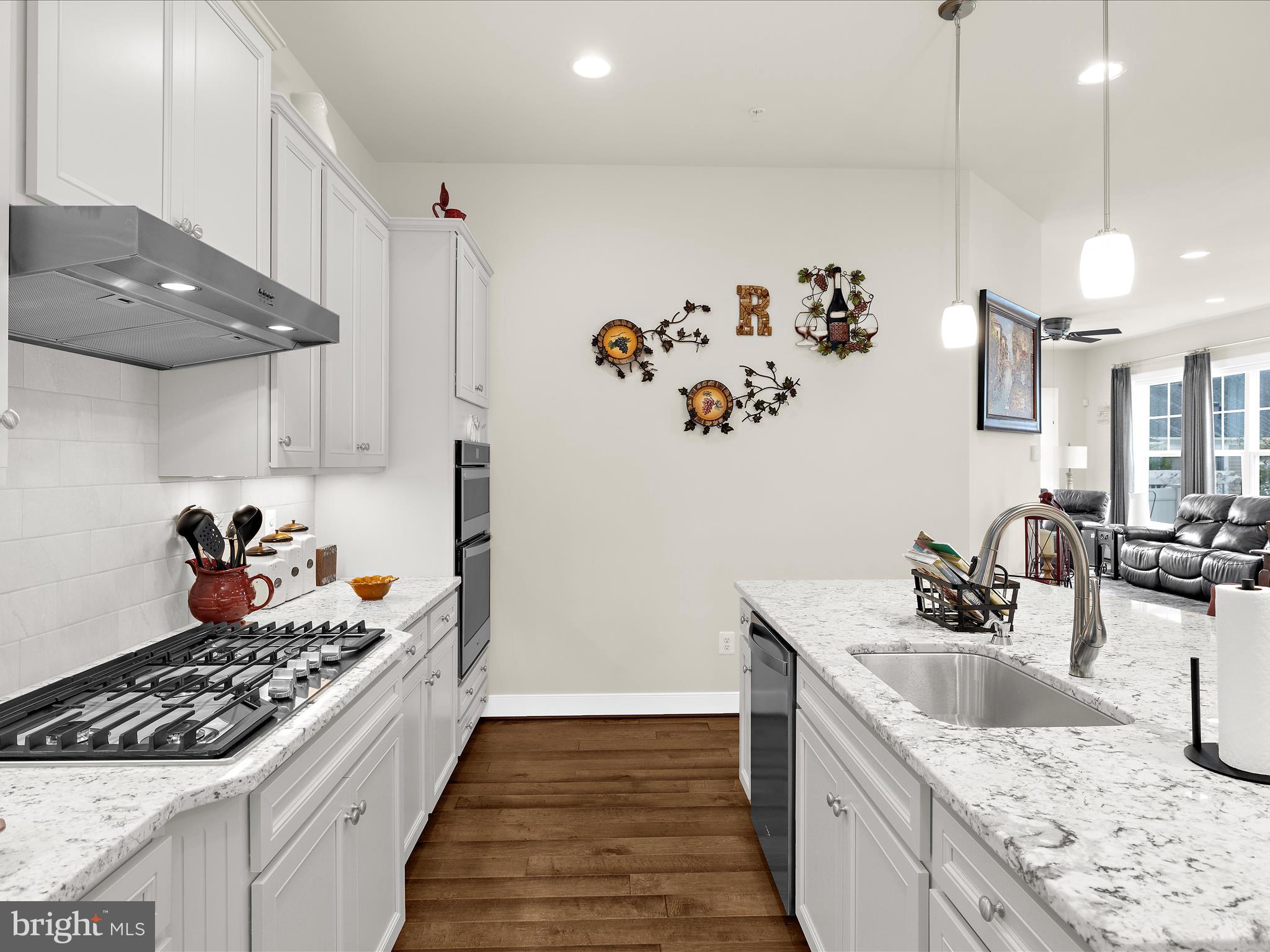 1530 Yellow Sand Lane Odenton, MD 21113 - Photo 18 of 87 a kitchen with a sink a stove and refrigerator
