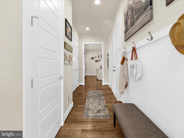 a spacious bedroom with a bed and couch