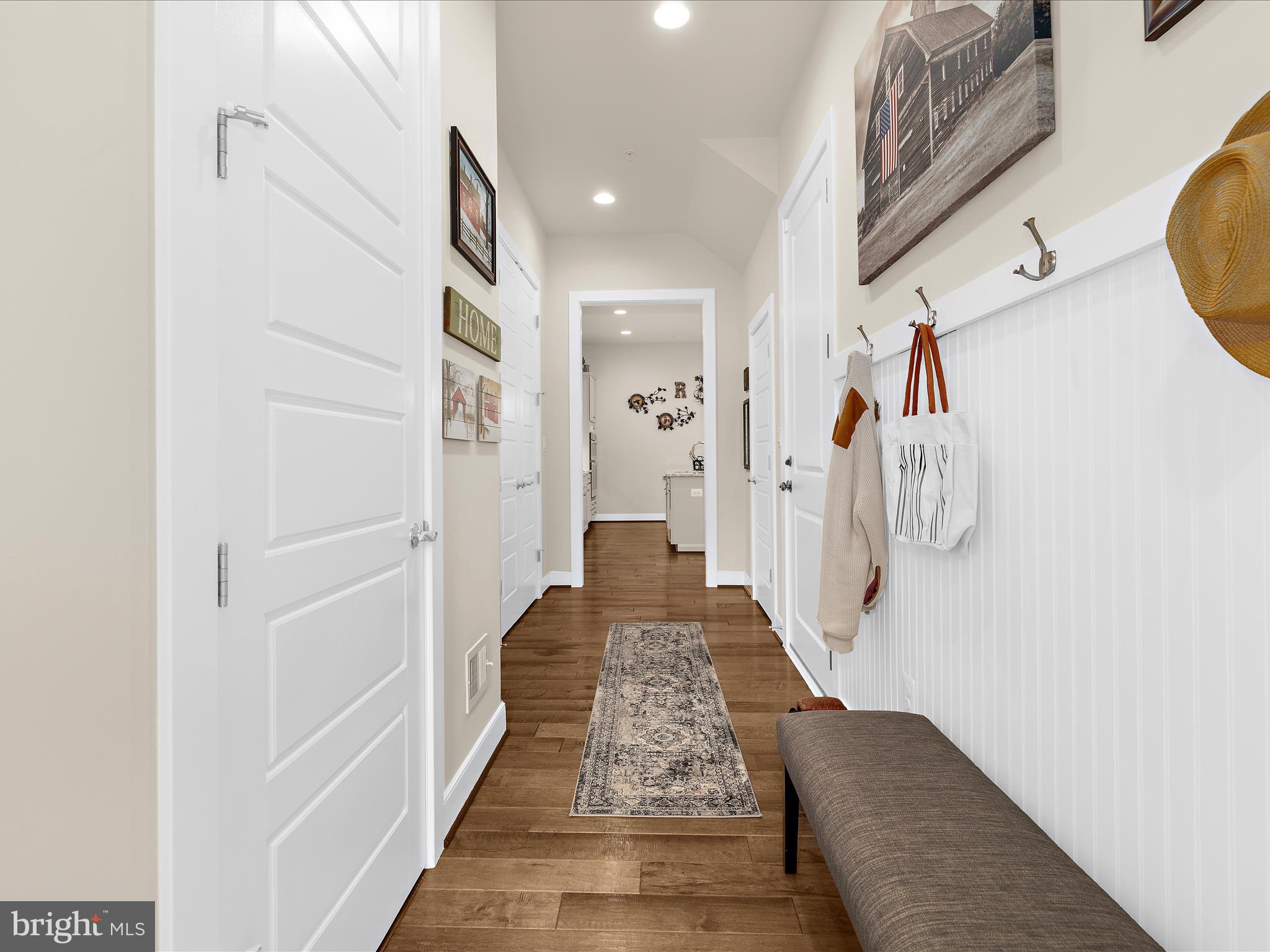 1530 Yellow Sand Lane Odenton, MD 21113 - Photo 20 of 87 a view of a hallway with wooden floor and staircase