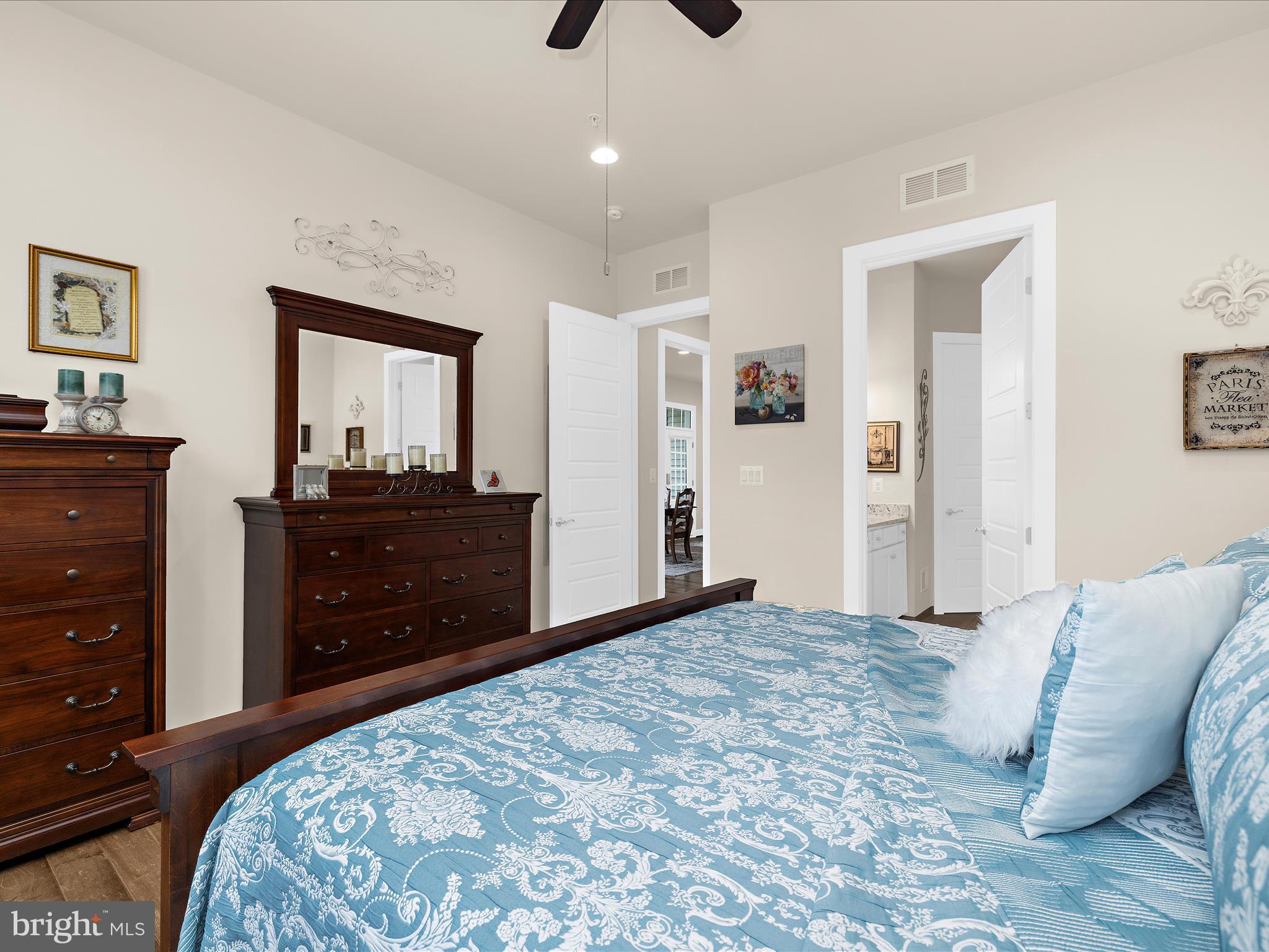 1530 Yellow Sand Lane Odenton, MD 21113 - Photo 24 of 87 a bedroom with a bed and a dresser