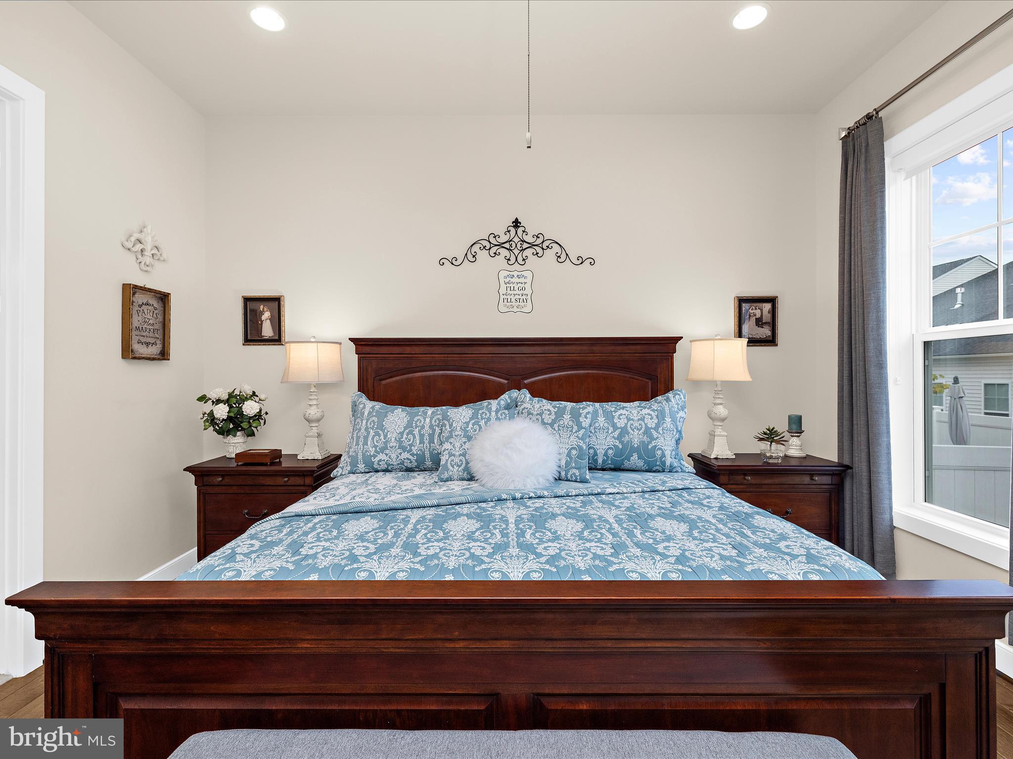1530 Yellow Sand Lane Odenton, MD 21113 - Photo 25 of 87 a bedroom with a large bed and a potted plant on the dresser