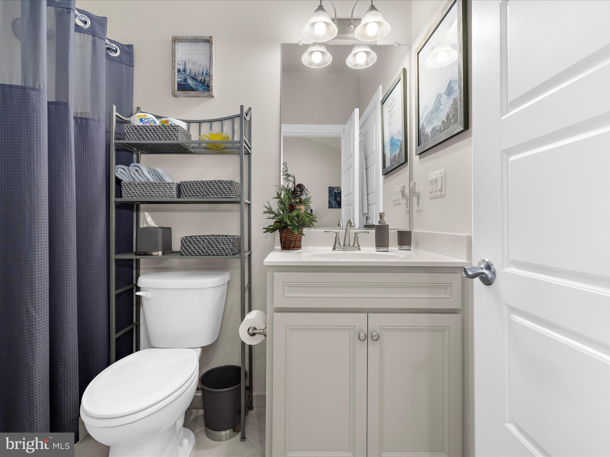1530 Yellow Sand Lane Odenton, MD 21113 - Photo 35 of 87 a bathroom with a toilet a sink and a mirror
