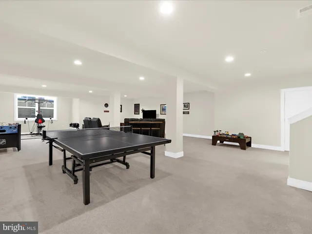 a view of a swimming pool with a yard