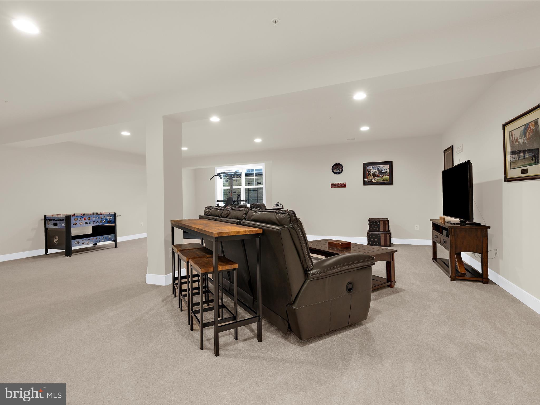 1530 Yellow Sand Lane Odenton, MD 21113 - Photo 44 of 87 a living room with furniture and a flat screen tv