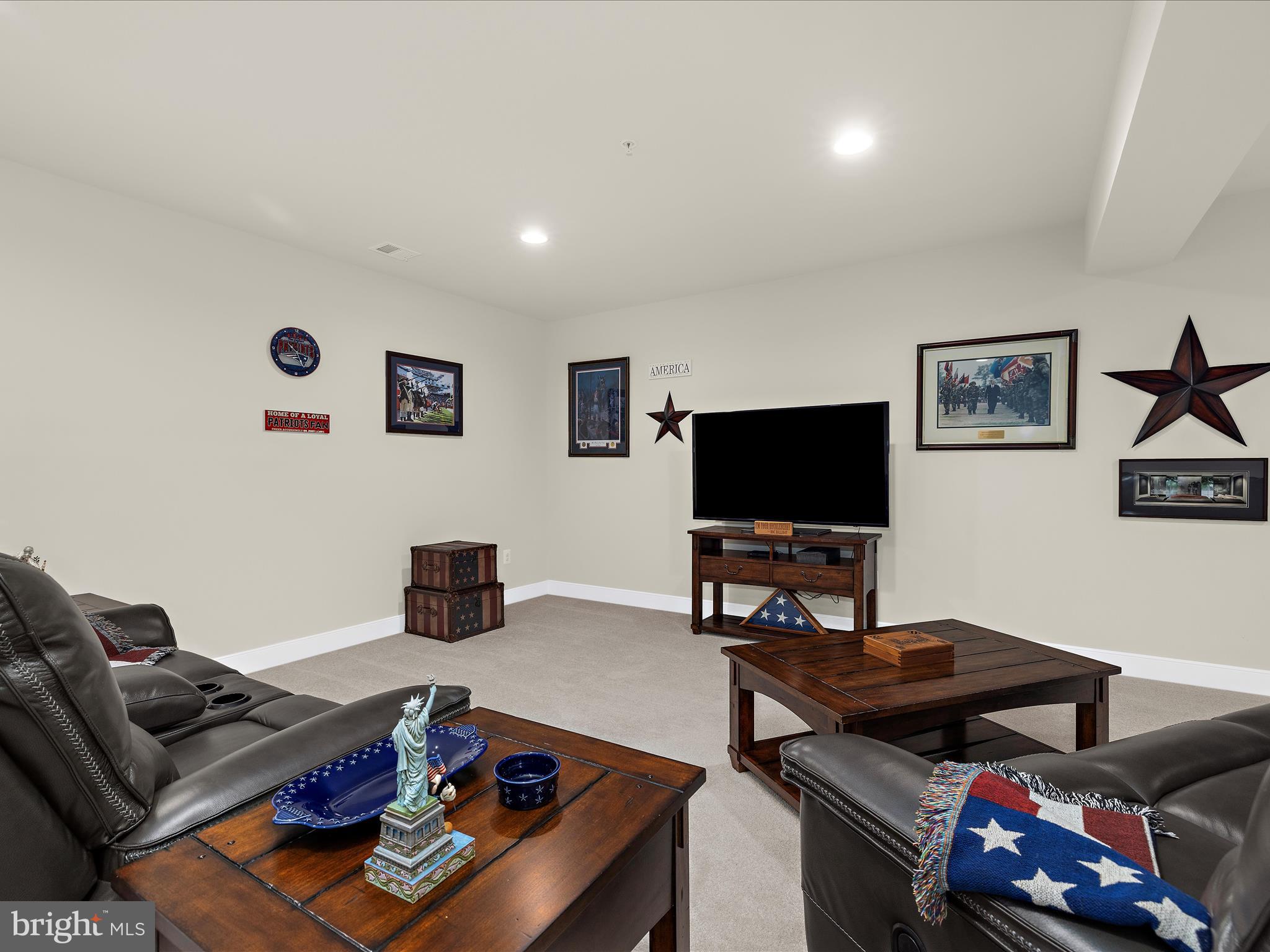 1530 Yellow Sand Lane Odenton, MD 21113 - Photo 46 of 87 a living room with furniture and a flat screen tv