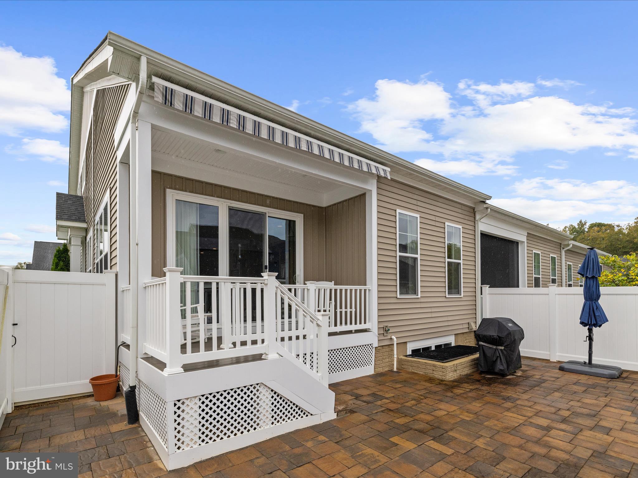 1530 Yellow Sand Lane Odenton, MD 21113 - Photo 55 of 87 a view of a house with a bench in front of it