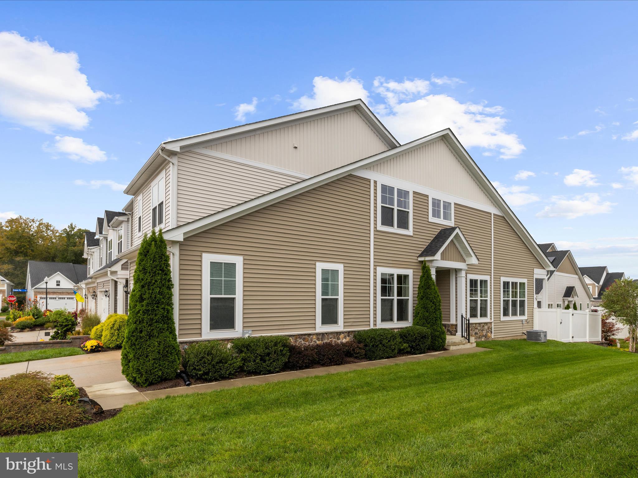 1530 Yellow Sand Lane Odenton, MD 21113 - Photo 57 of 87 a view of a yard in front of a house with plants and large tree