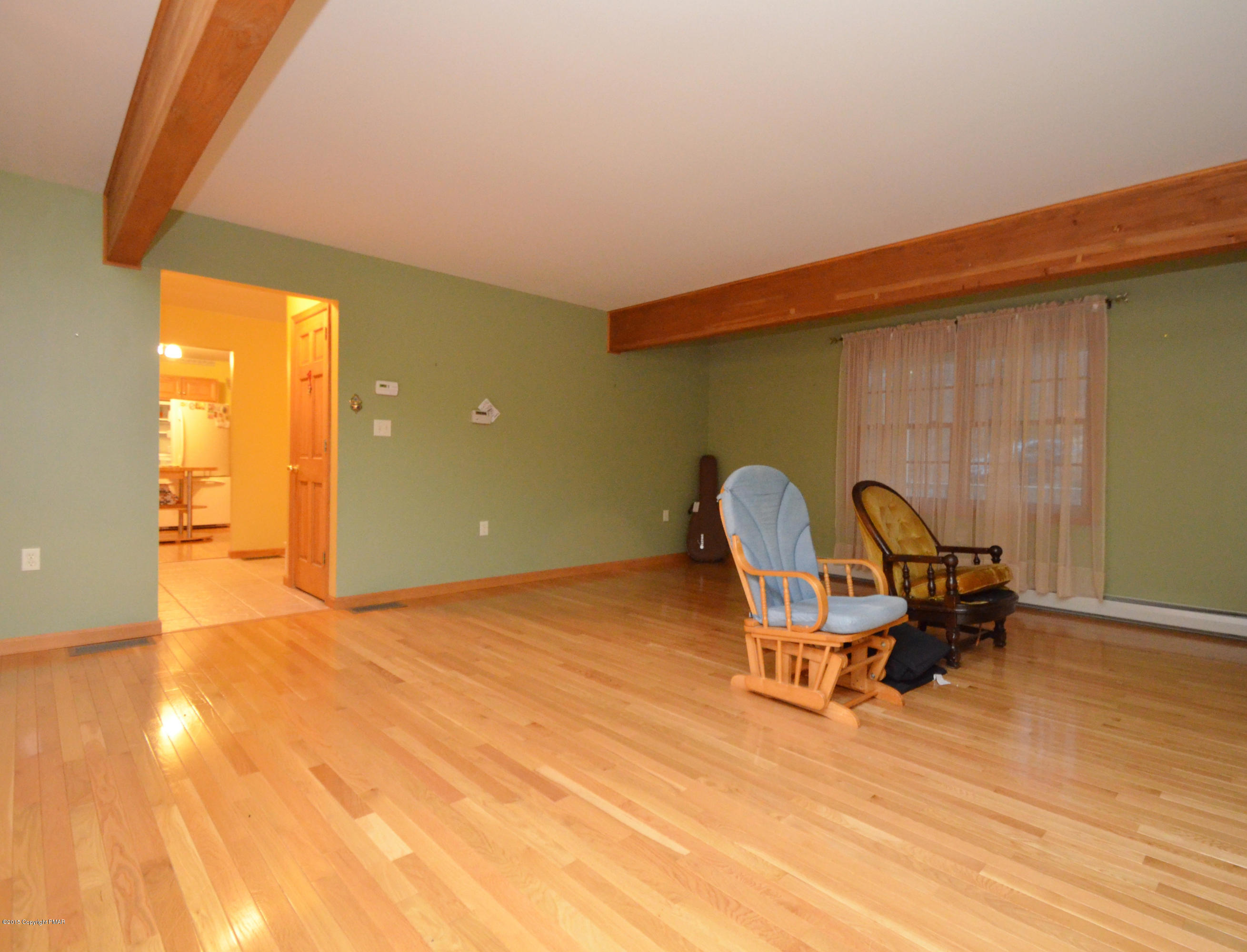 699 Buckle Boot Road Henryville, PA 18332 - Photo 11 of 26 a workspace with furniture and window