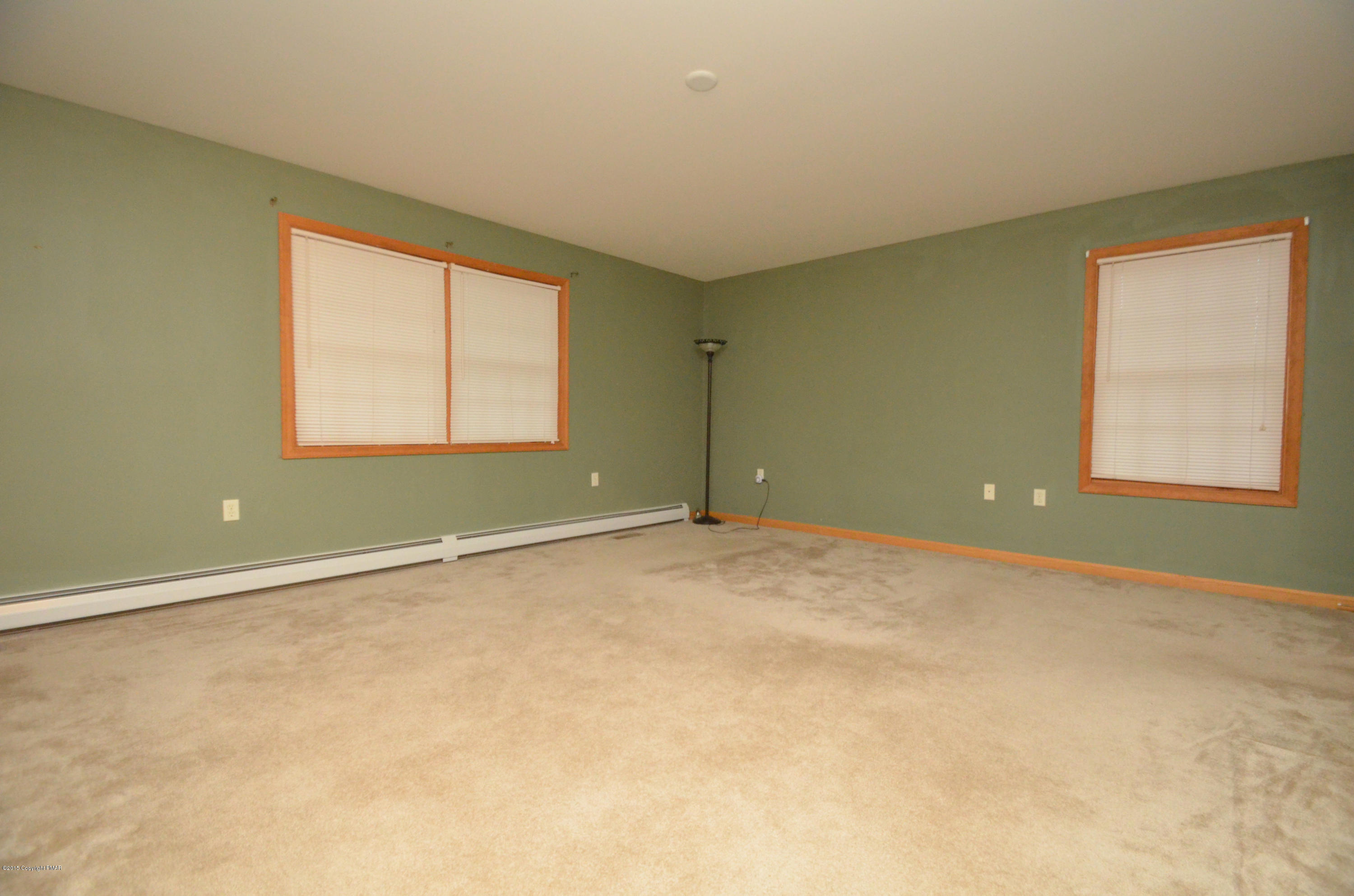 699 Buckle Boot Road Henryville, PA 18332 - Photo 14 of 26 an empty room with a window