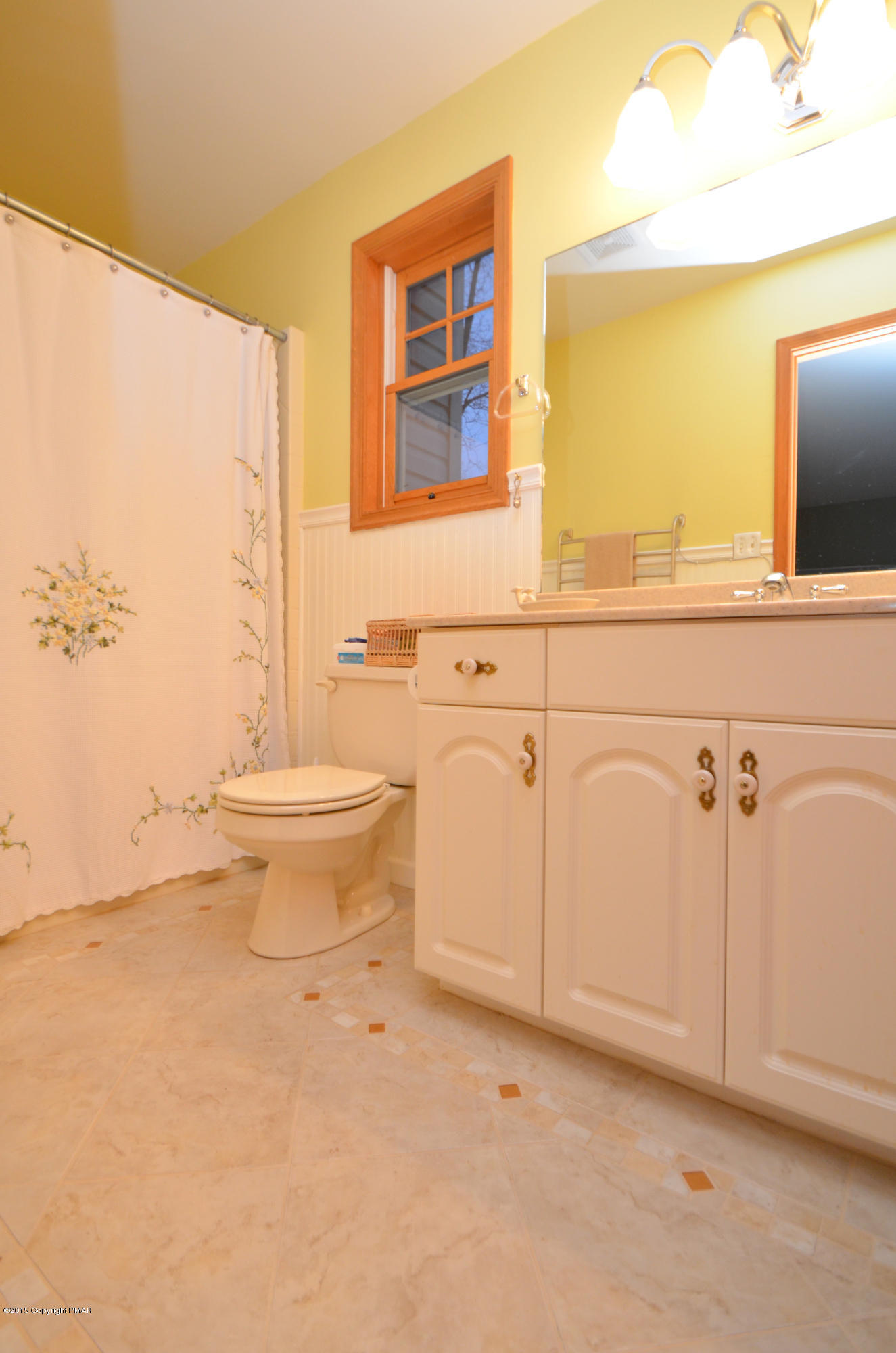 699 Buckle Boot Road Henryville, PA 18332 - Photo 16 of 26 a bathroom with a toilet sink and mirror