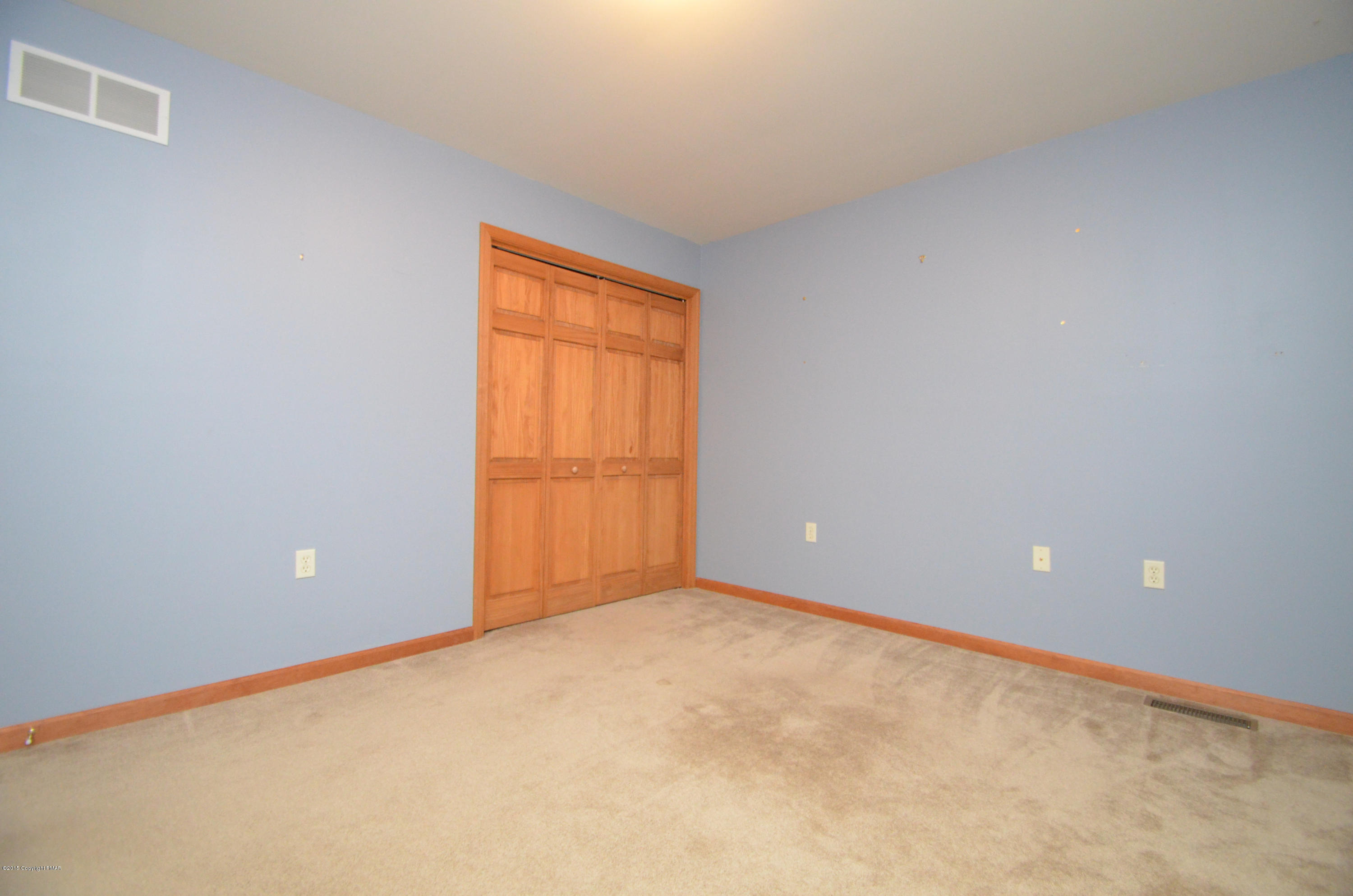 699 Buckle Boot Road Henryville, PA 18332 - Photo 20 of 26 a view of an empty room with a window