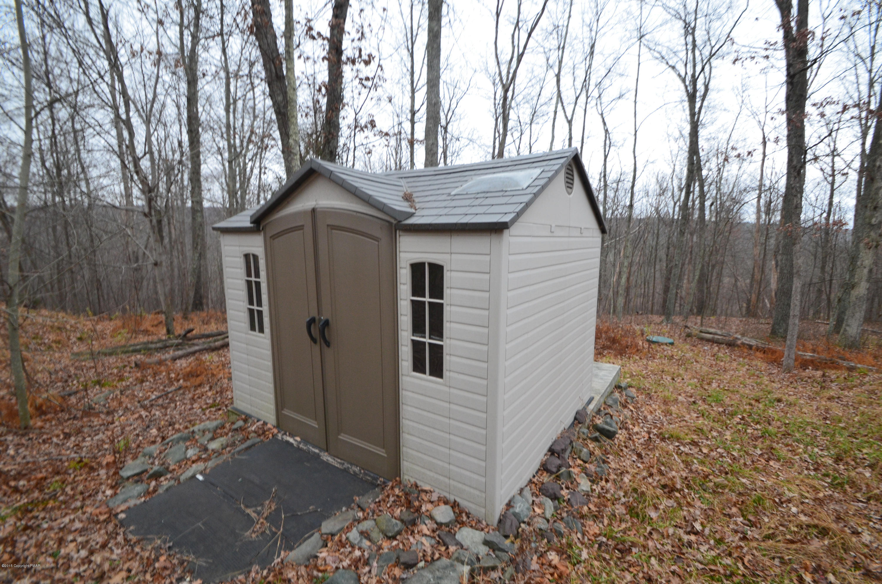 699 Buckle Boot Road Henryville, PA 18332 - Photo 25 of 26 a house view with a outdoor space