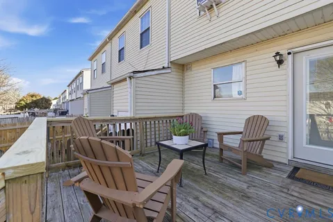 a view of a balcony with furniture