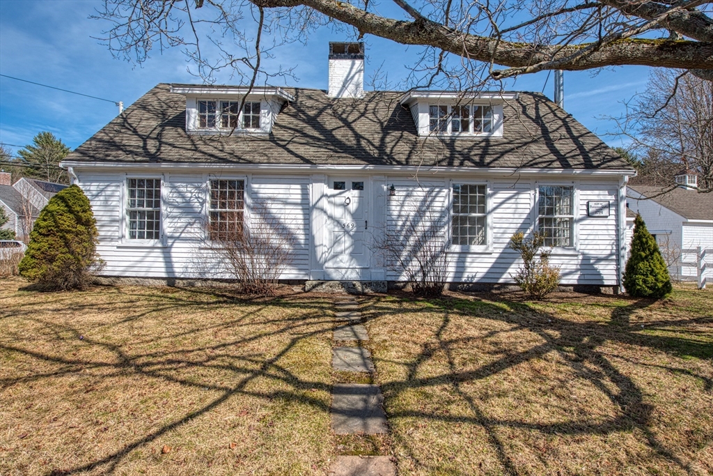 569 Main Street Hanover, MA 02339 - Photo 2 of 34 a view of a house with a patio