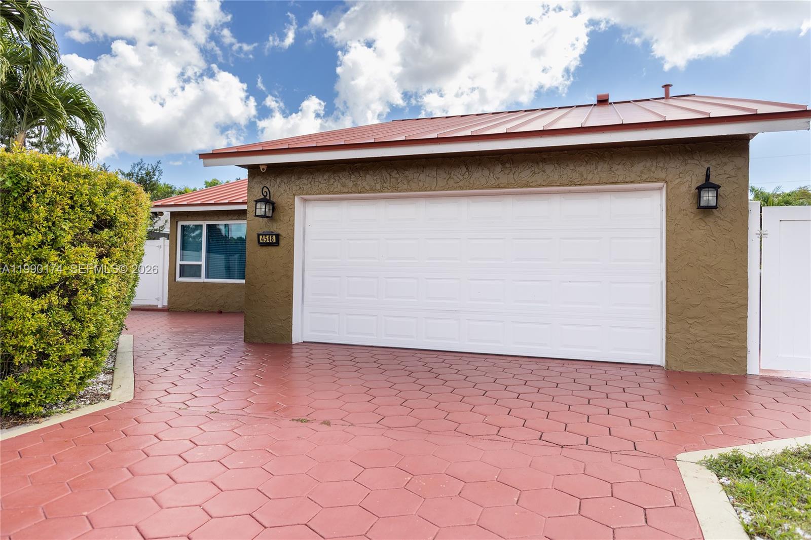 4548 Southwest 28th Way Dania Beach, FL 33312 - Photo 3 of 63 a house with a outdoor space