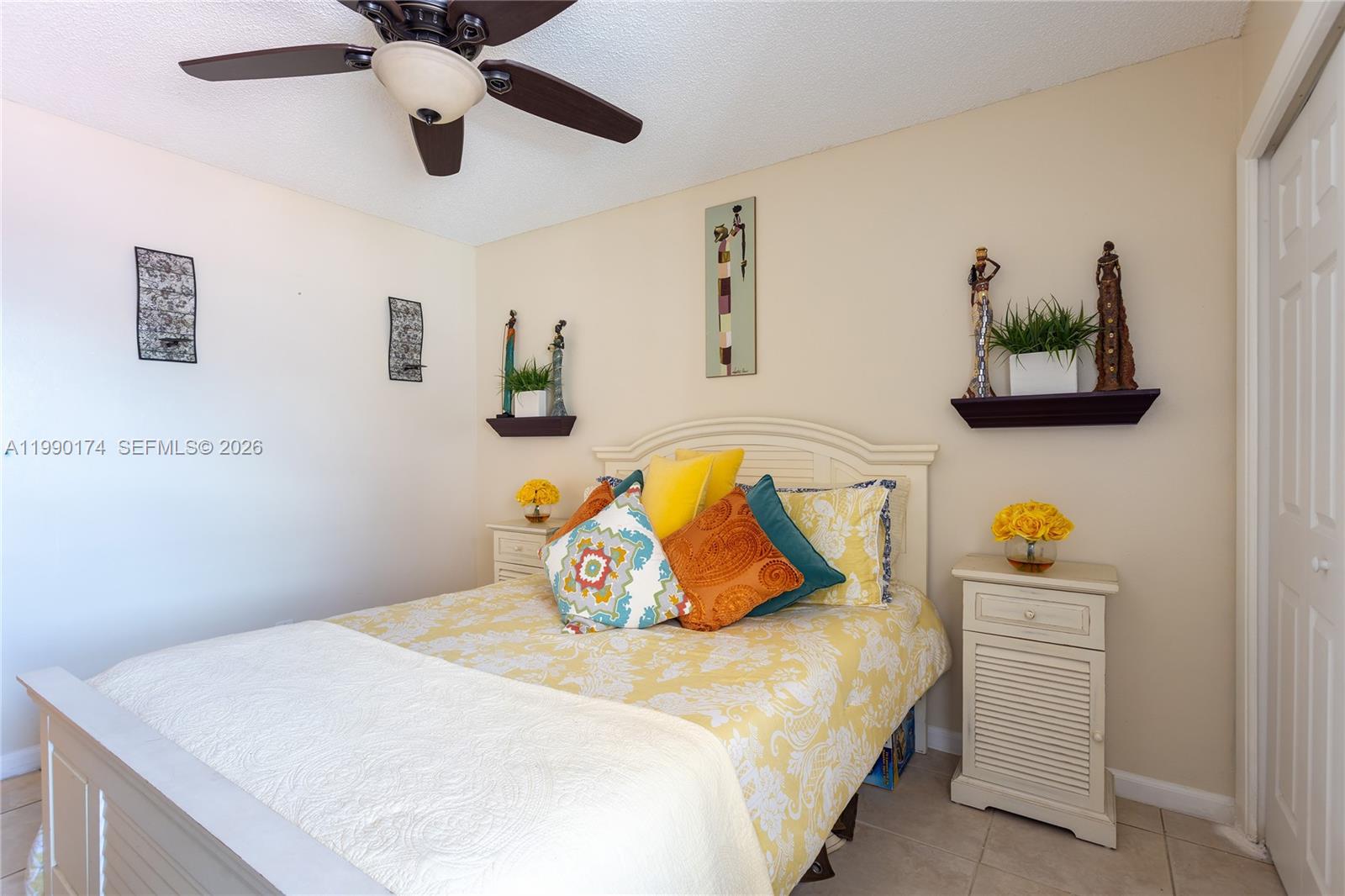 4548 Southwest 28th Way Dania Beach, FL 33312 - Photo 34 of 63 a bedroom with a bed and a dresser