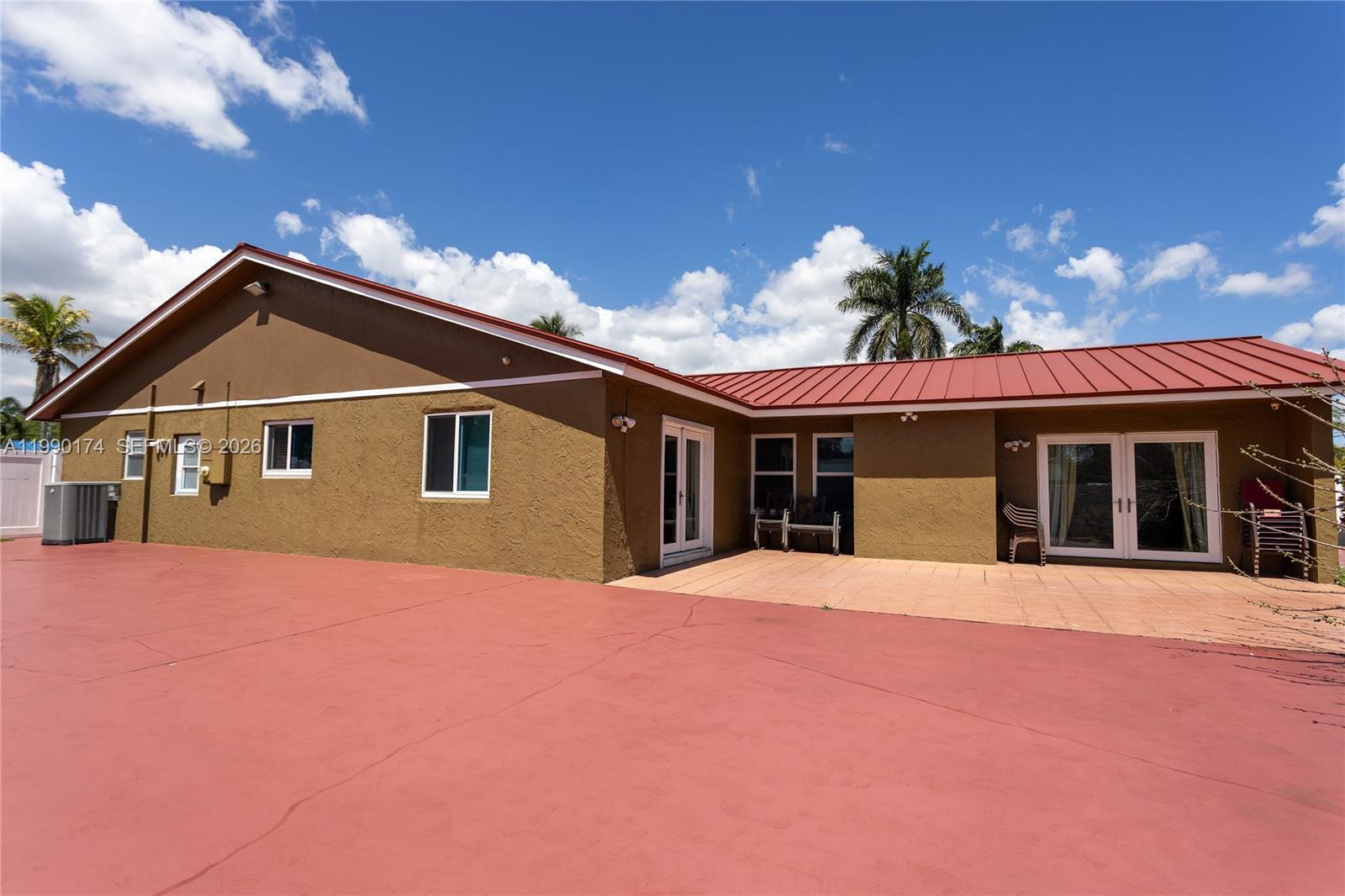 4548 Southwest 28th Way Dania Beach, FL 33312 - Photo 40 of 63 a front view of a house with a yard