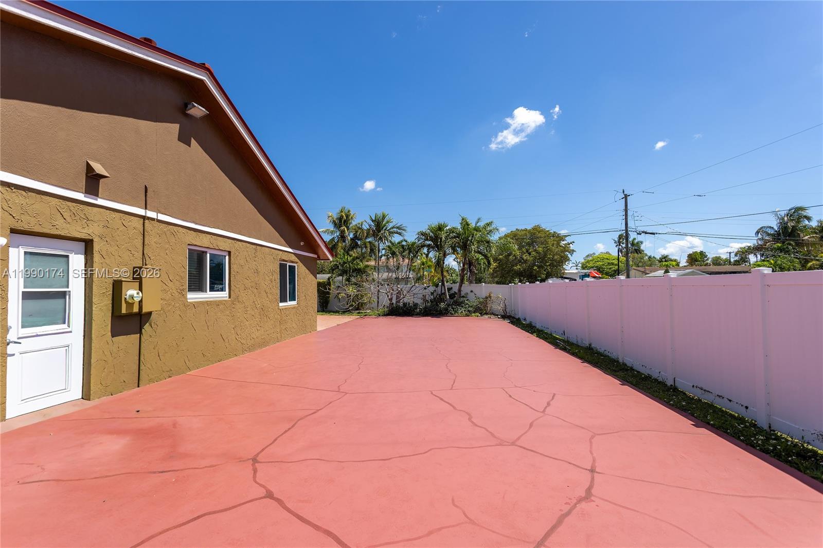 4548 Southwest 28th Way Dania Beach, FL 33312 - Photo 48 of 63 a front view of a house with a yard