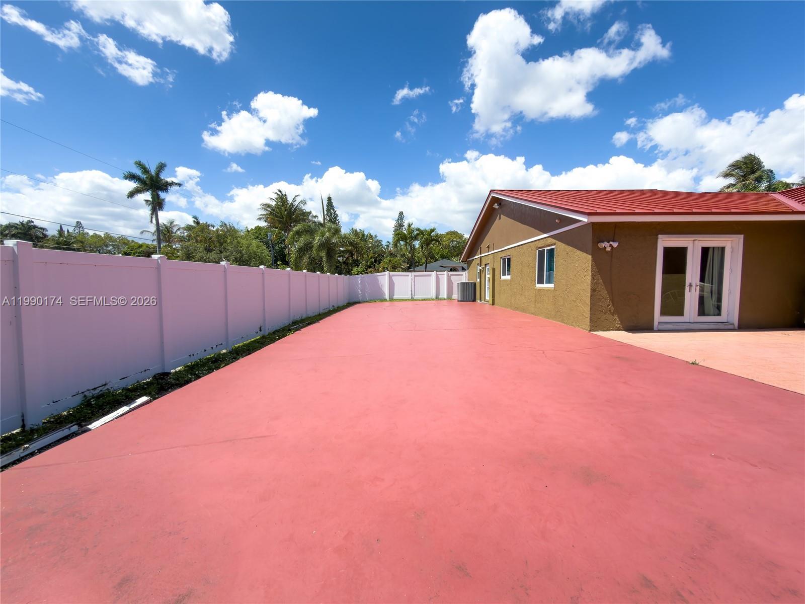 4548 Southwest 28th Way Dania Beach, FL 33312 - Photo 49 of 63 a view of a house with a backyard