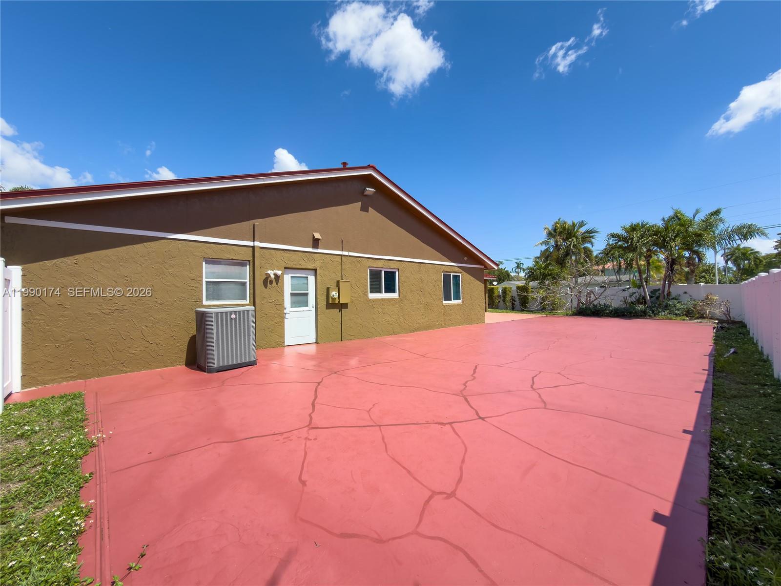 4548 Southwest 28th Way Dania Beach, FL 33312 - Photo 50 of 63 a front view of a house with a yard