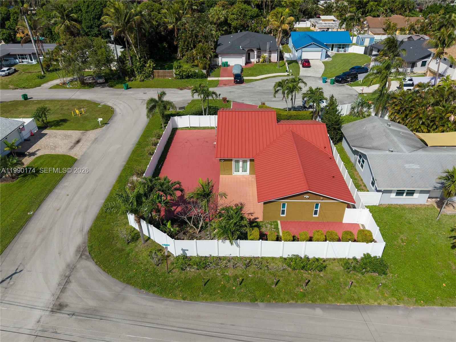 4548 Southwest 28th Way Dania Beach, FL 33312 - Photo 56 of 63 an aerial view of residential houses with yard and swimming pool