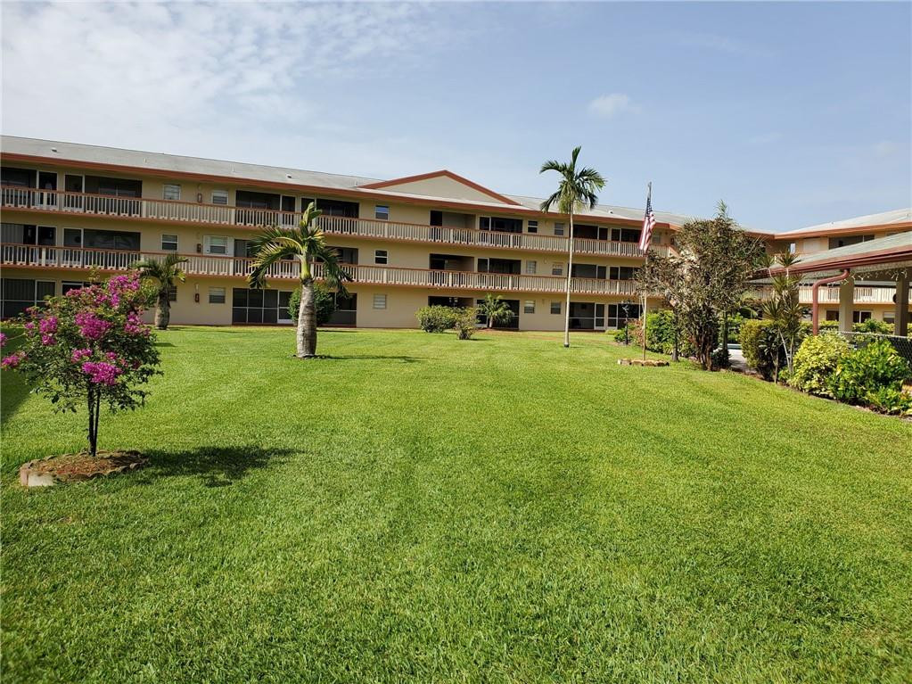 5300 Washington Street, Unit H136 Hollywood, FL 33021 - Photo 33 of 38 a front view of a house with a yard
