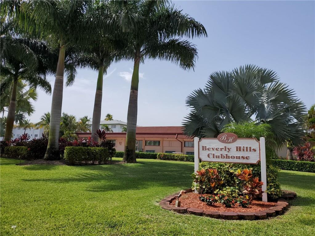 5300 Washington Street, Unit H136 Hollywood, FL 33021 - Photo 35 of 38 a sign on the side of the building