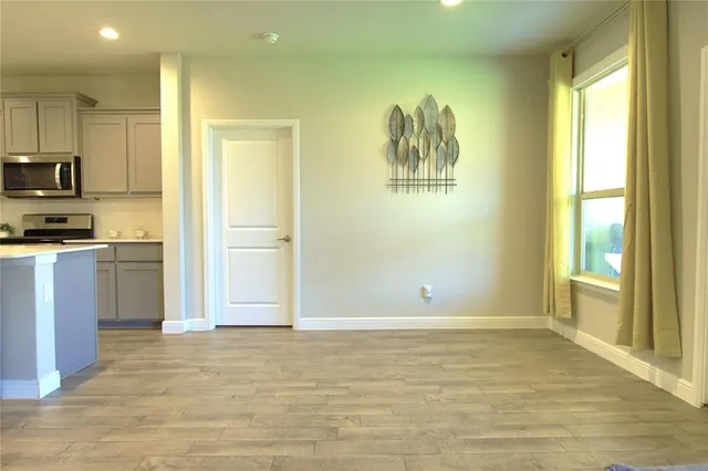 a view of a kitchen with a sink