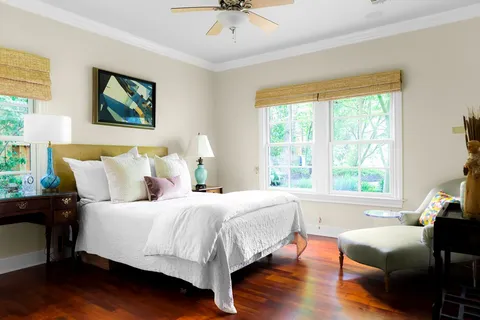 a bedroom with a bed and a couch