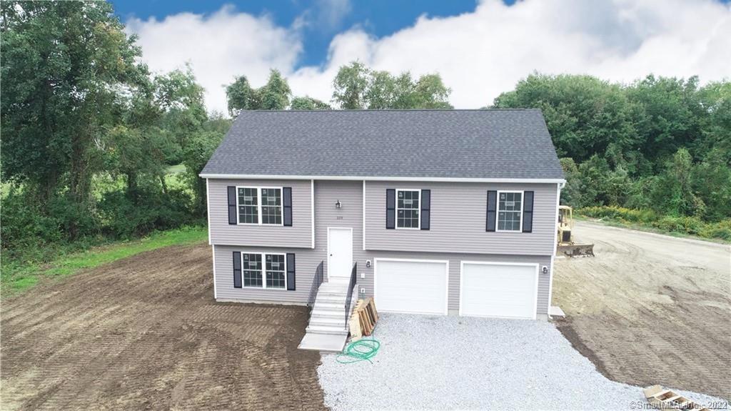 109 Cottage Road Montville, CT 06370 - Photo 1 of 1 a front view of a house with a yard